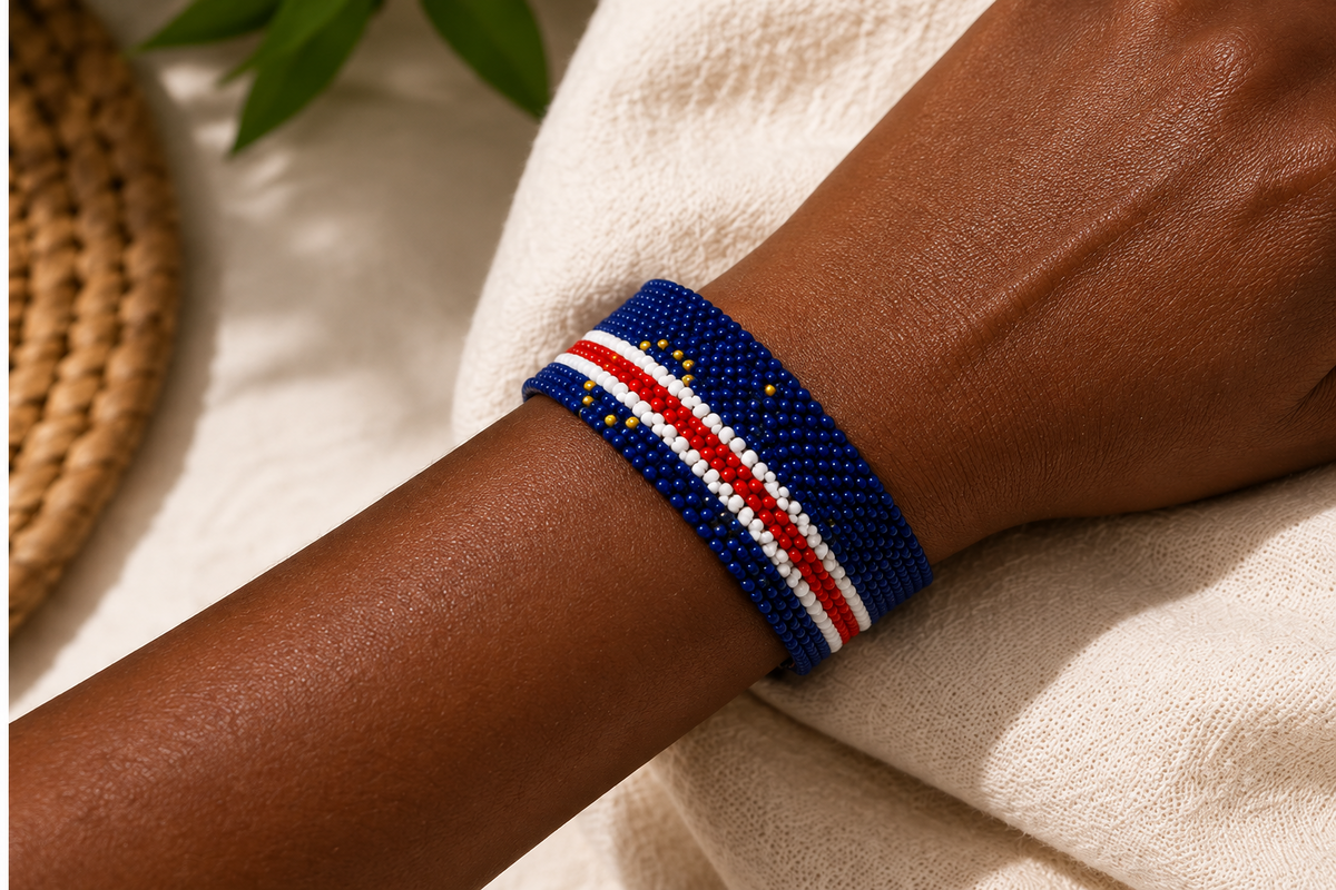 Handmade Cape Verde flag beaded bracelet worn on wrist in a lifestyle setting